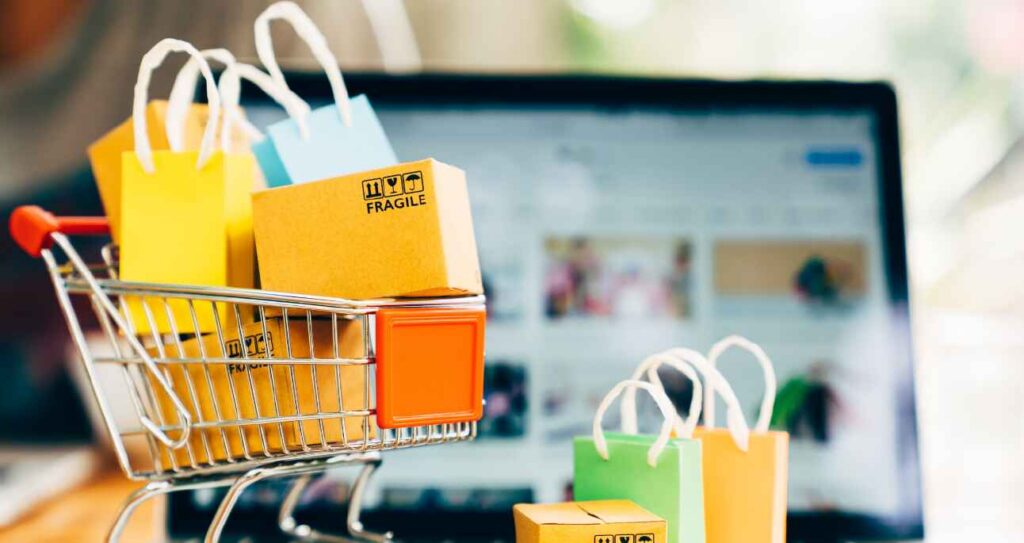 photo of a cart with shopping bags