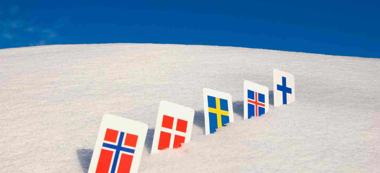 Nordic Europe country flags on snow