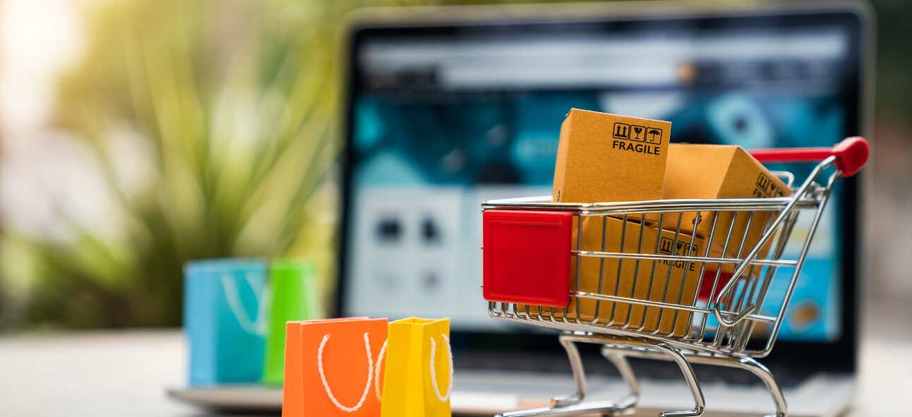 A tiny cart with products kept close to a web shop